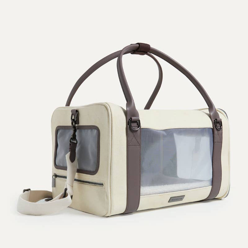 Pet carrier with transparent sides on a white background